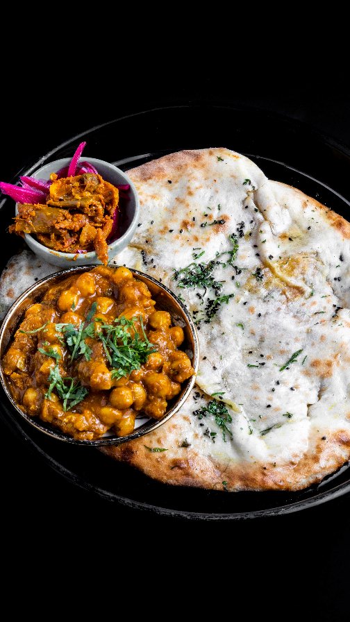 Fresh from the tandoor and straight to your soul. ✨ The secret is in the stuffing. 🤫 Our Amritsari Kulcha is packed wit